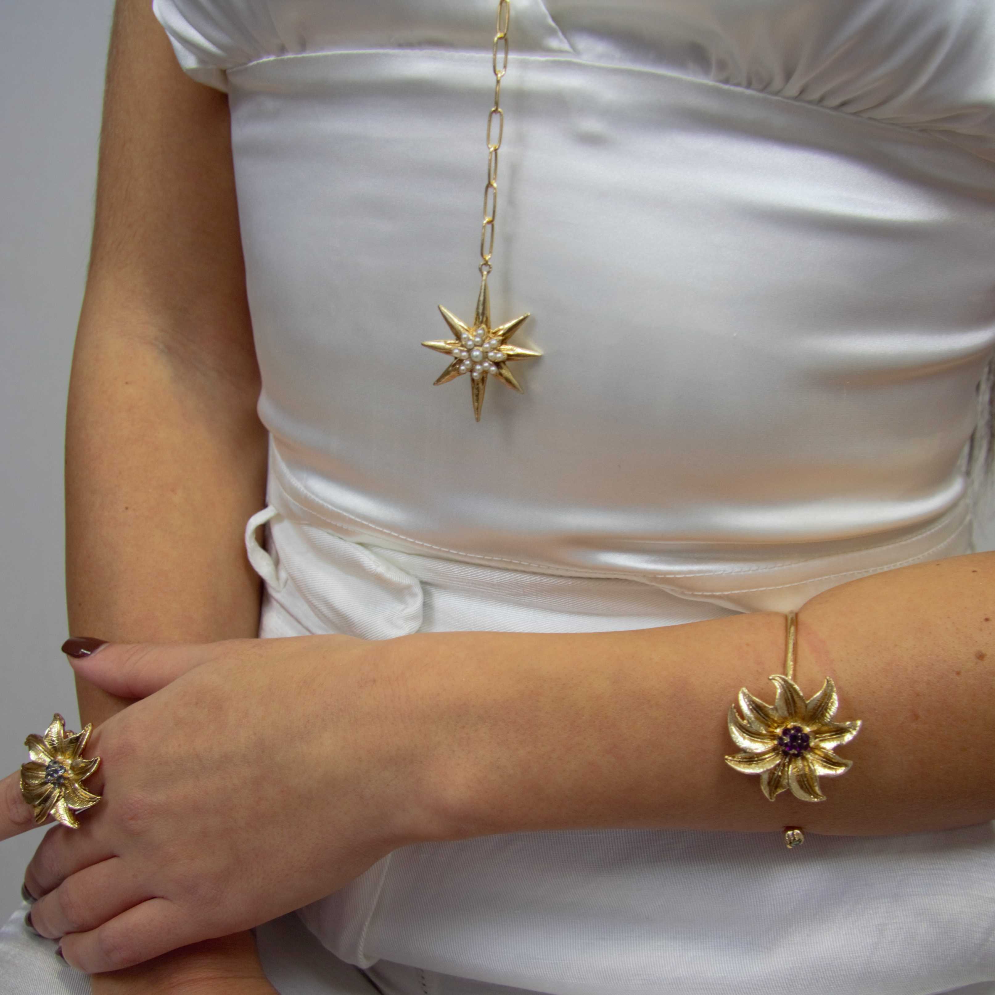 Colgante estrella perlas